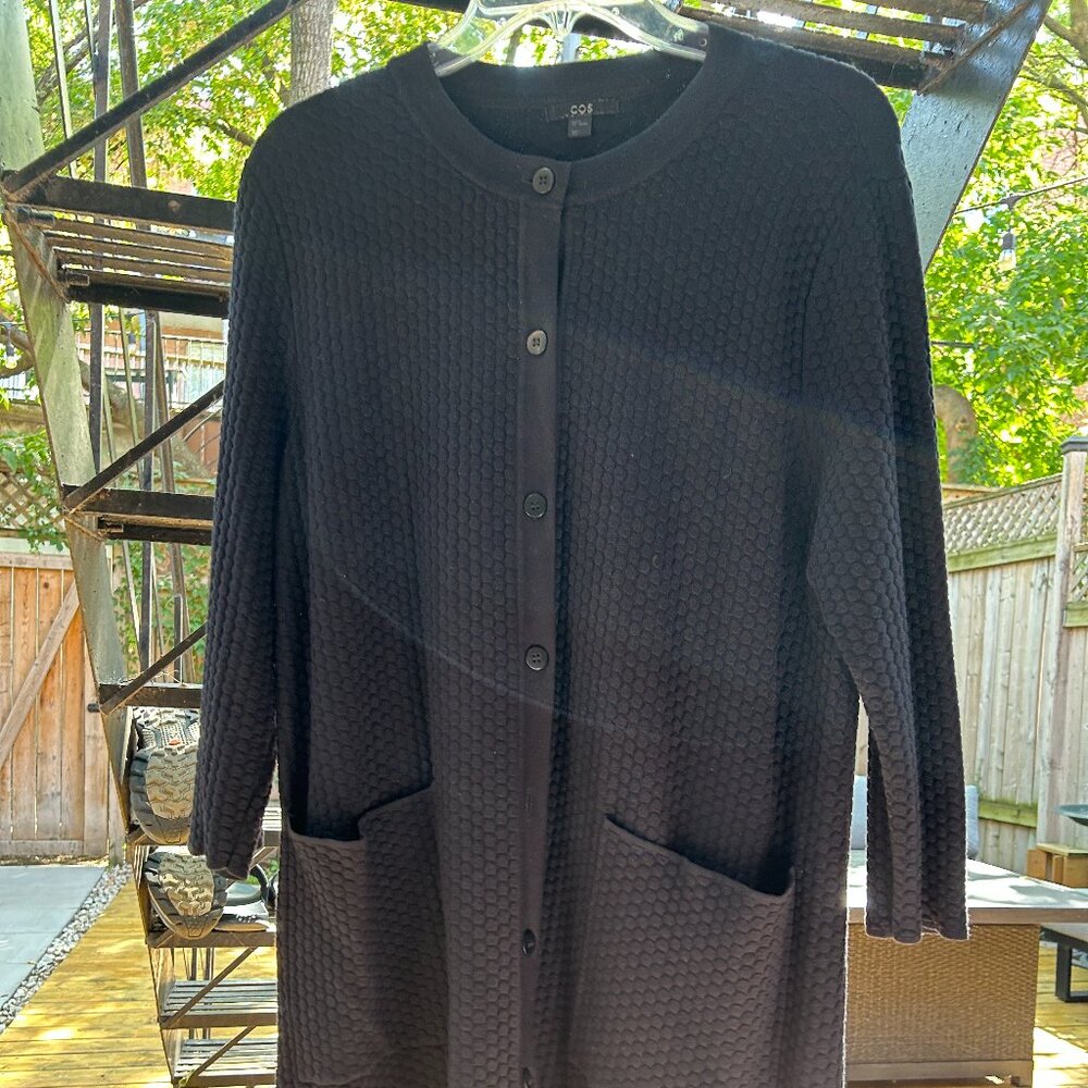 COS Black A line cardigan with large front pocket.